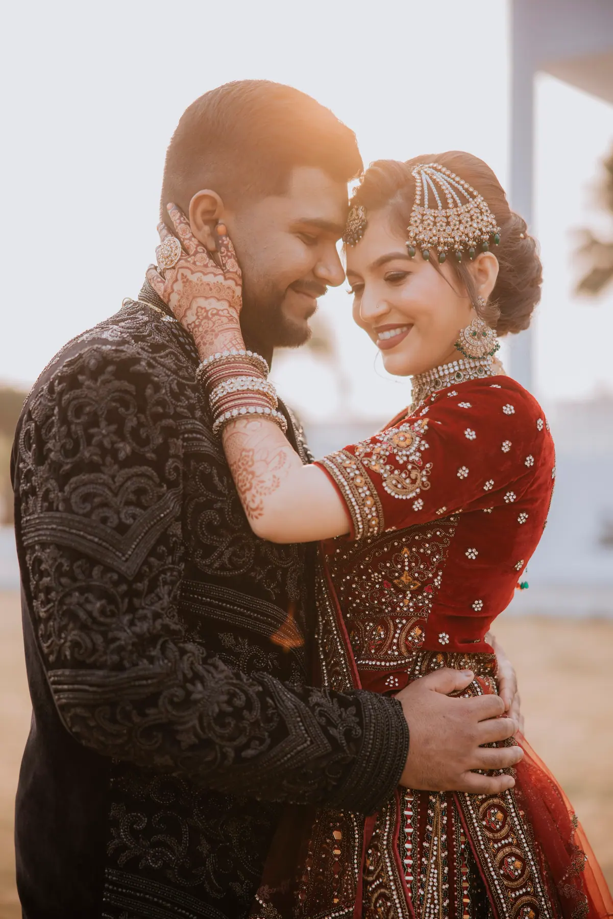 Aamir & Binish in a close red wedding portrait