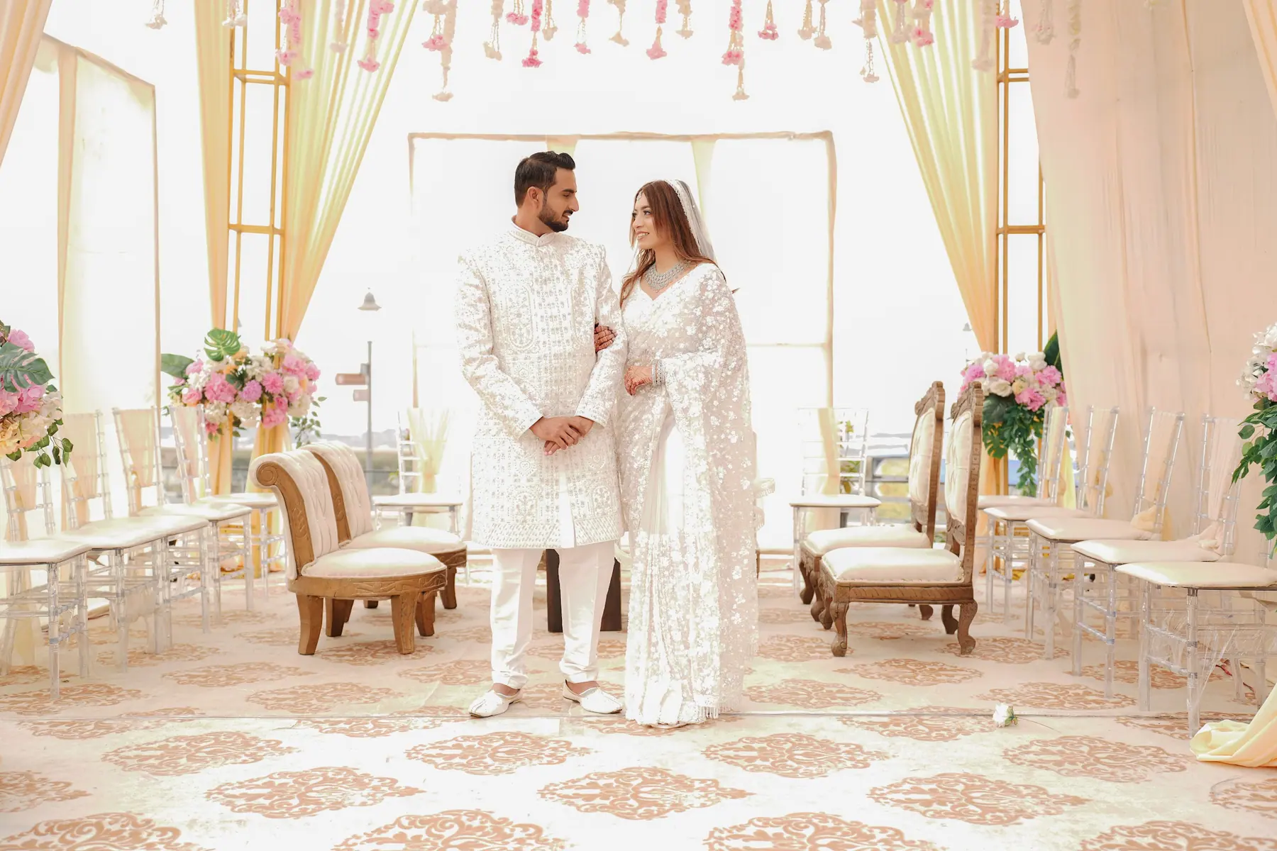 Monika & Aman together under the wedding canopy